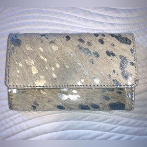Mer Sea cowhide belt wallet in white and silver.